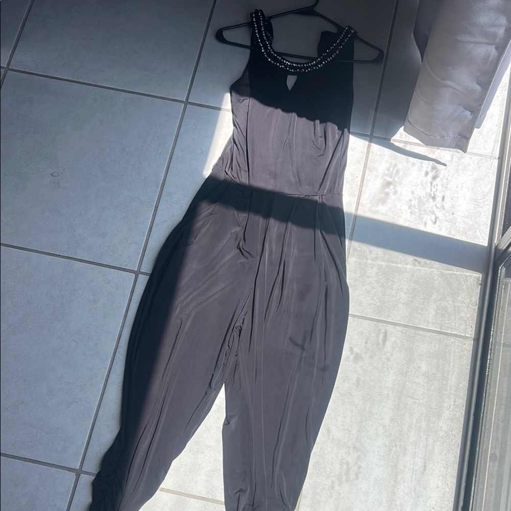 Elegant Black Jumpsuit with Beaded Neckline